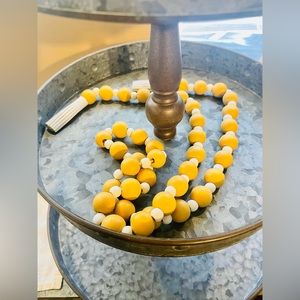*Distressed Yellow and White Bead Garland With Tassels